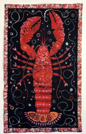 Colourful abstract lobster on patterned textile background.